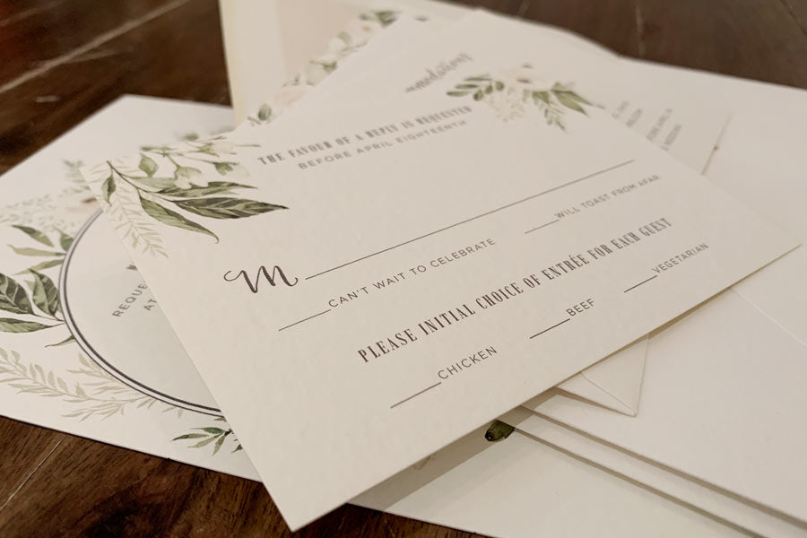 Close up of custom designed invitations from Peabody Papers